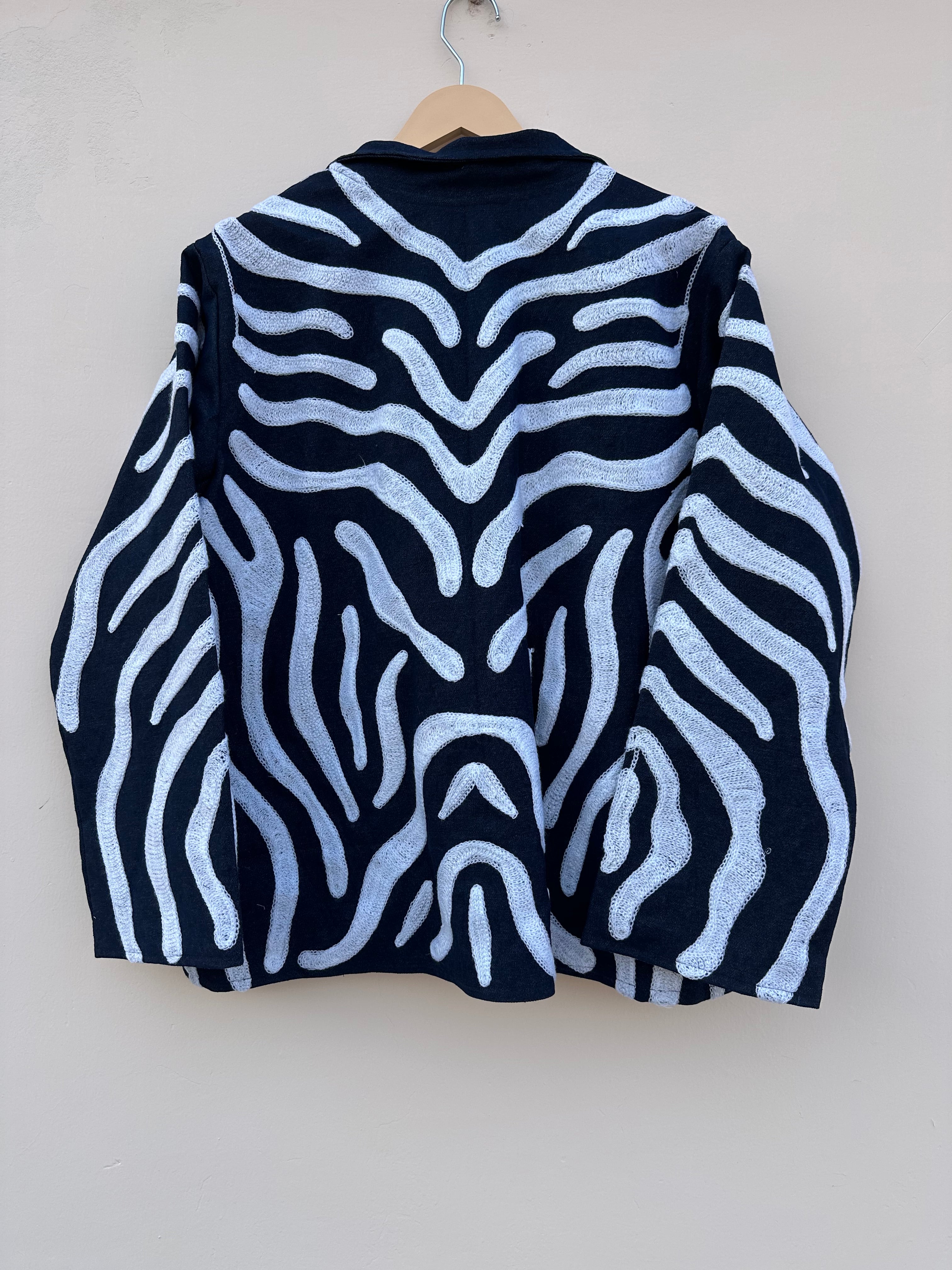 Indigo Wave Embroidered Denim Jacket with Striped Lining