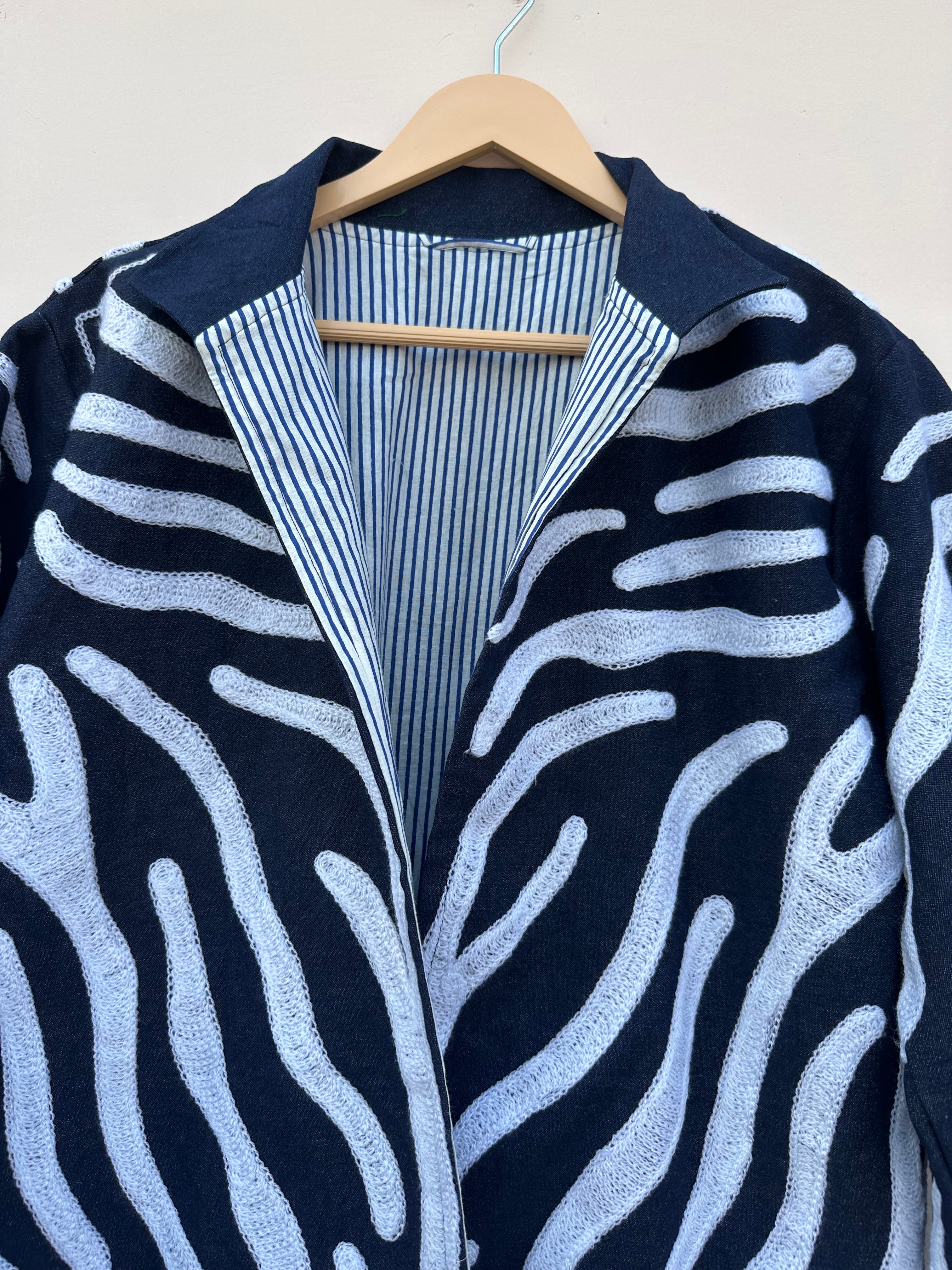 Indigo Wave Embroidered Denim Jacket with Striped Lining