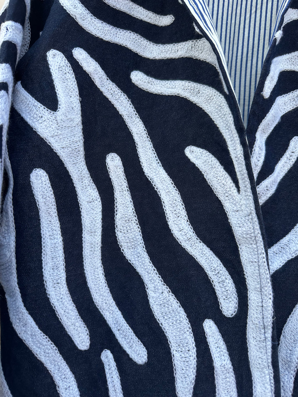 Indigo Wave Embroidered Denim Jacket with Striped Lining